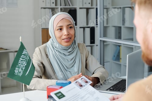 Preview: Consular Officer Interviewing Man At Office