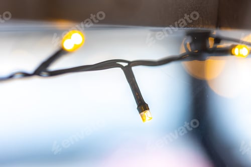 Preview: LED lights garland, light bulbs on a bokeh background.