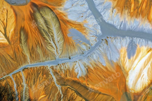 Preview: Flying over surreal patterns of flowing colorful mining chemical residuals aerial