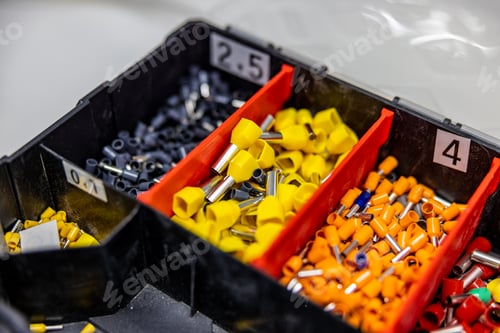 Preview: Close up of a tool box with a lot of different electrical pins