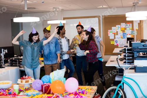 Preview: Creative business team dancing together
