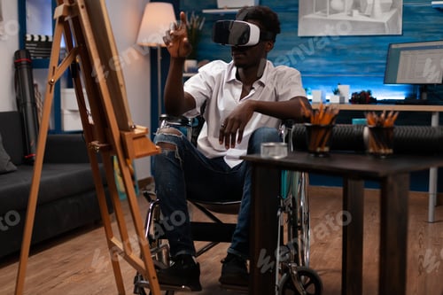Preview: Man illustrator wearing virtual reality headset for imagining draw sketch