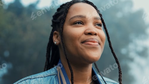 Preview: Face, thinking and a happy woman outdoor in nature to relax and breath fresh air to relax. Vacation