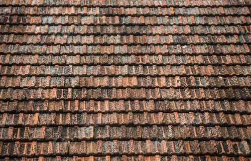 Preview: Texture of old weathered red roof tiles.
