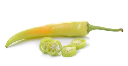 Preview: green chilli pepper on white background.