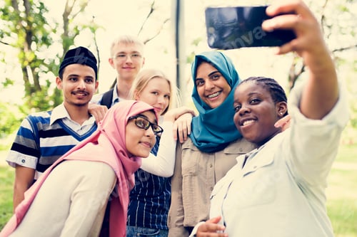 Preview: Group of students using mobile phone