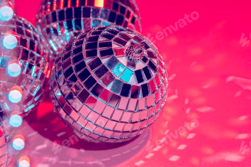 Preview: Mirror disco balls over pink background. Party, nightlife concept
