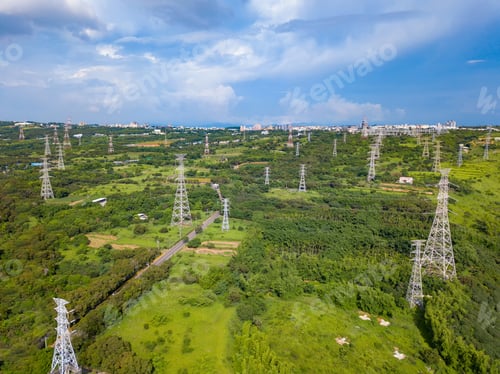 Preview: Aerial view of highways and high voltage metal post in the industrial estate. Electricity tower.