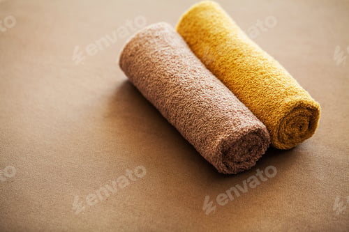 Preview: Chocolate Spa . Composition brown towel in hotel room of spa treatment