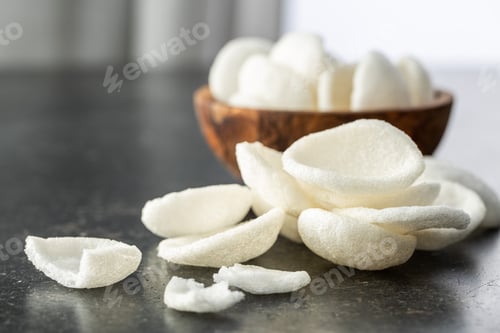 Preview: Puffed white snack chips. White potato chips.
