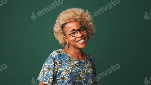 Preview: Happy friendly girlsmiling and broadly laughing out loud with white teeth