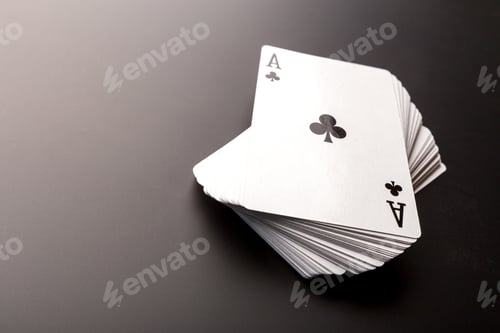 Preview: poker chips and cards on black background