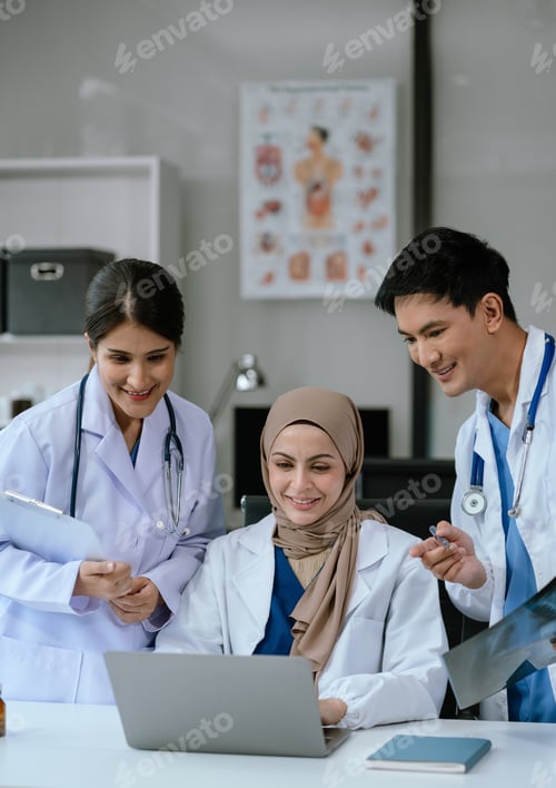 Preview: Medical team using clipboard and digital tablet find information patient medical
