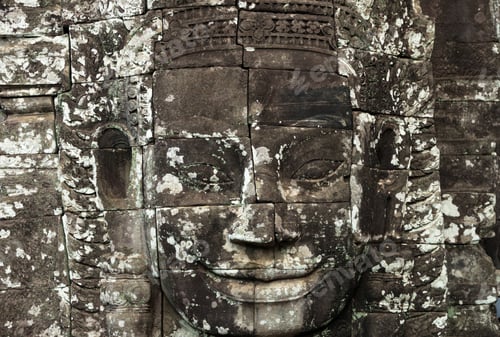 Preview: Closeup the Stone face of Ancient Bayon Temple at Angkor Thom. Siem Reap, Cambodia