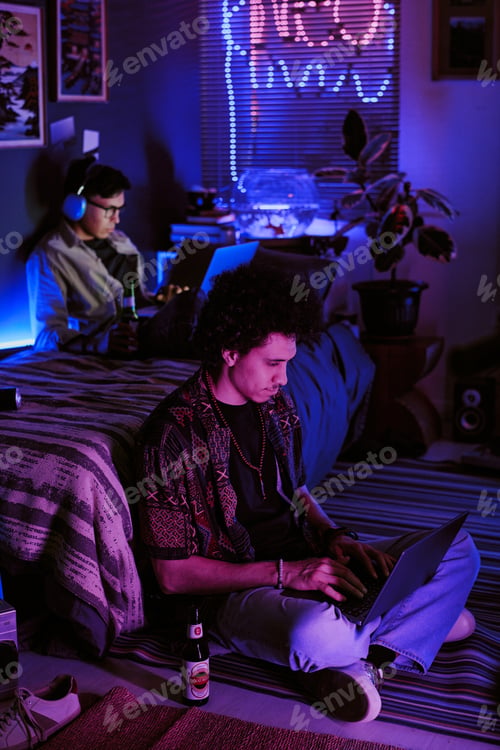 Preview: Student Chilling in Neon Room