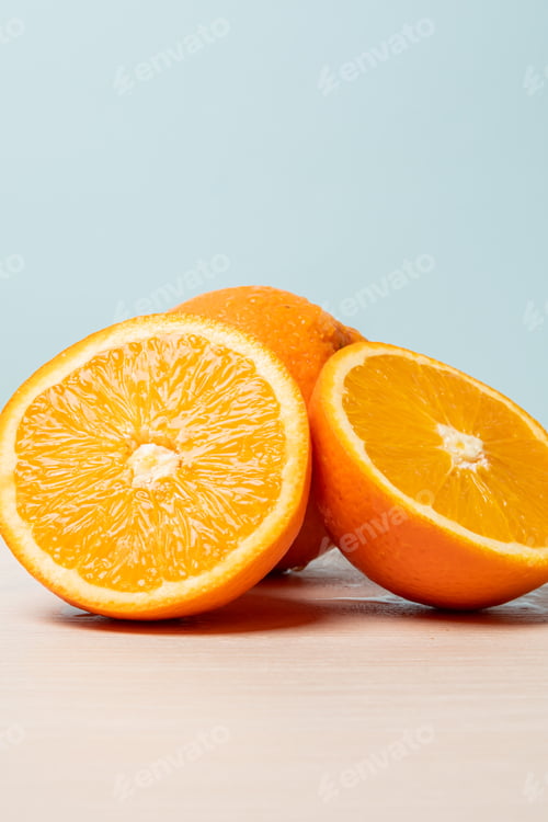 Preview: Vertical shot of freshly sliced oranges