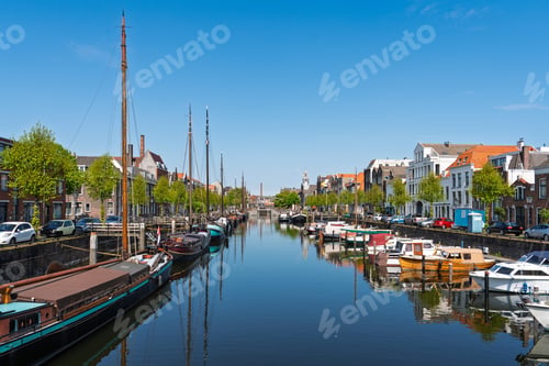Preview: Picturesque Rotterdam Canal Scene with Boats and Historic Buildings in the Netherlands, Europe