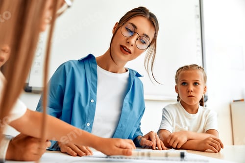 Preview: Children learning in a school classroom