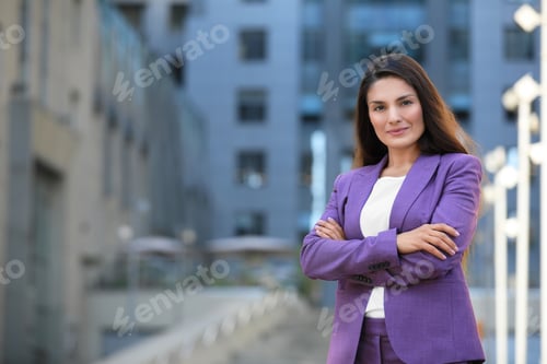 Preview: Beautiful confident businesswoman on city street. Space for text
