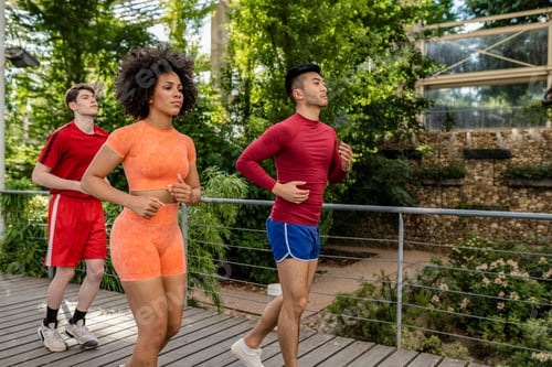 Preview: Group of multiracial runner friends progressing for fitness, health and wellness.