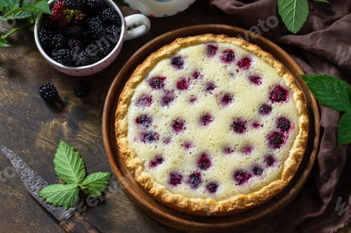 Preview: Homemade blackberry pie. Sweet pie with blackberry on rustic wooden table.