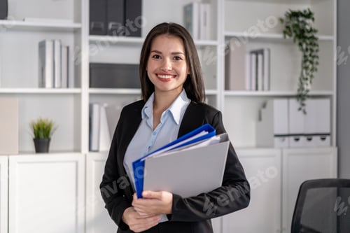 Preview: Portrait of Mixed race businesswoman working in the office workplace. A