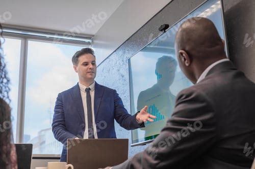Preview: business man plans future projects to make company profitable presentation in meeting room