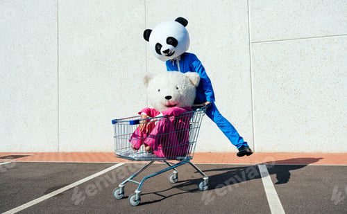 Preview: Storytelling image of a couple wearing giant panda head