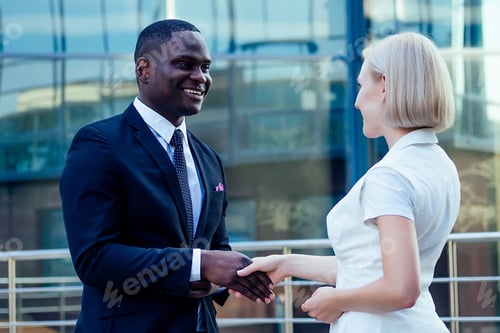 Preview: handsome African American man in a black business suit