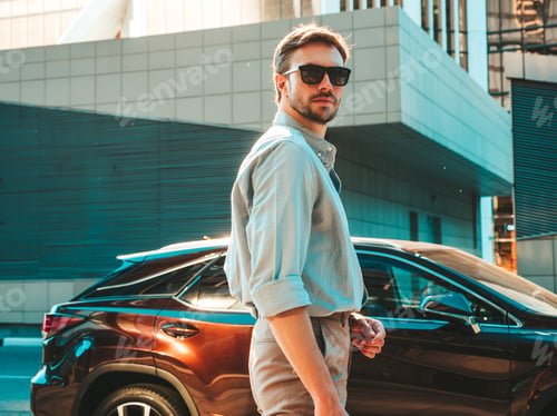 Preview: Handsome man posing outdoors