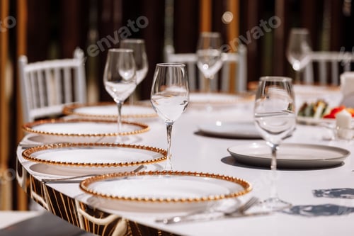 Preview: Empty glass set in restaurant. wedding, decor, celebration, holiday concept - romantic table setting