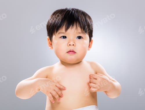 Preview: Adorable Toddler with Dark Hair Smiling