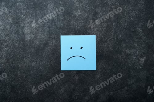Preview: Blue sticky notes blank with drawing sad face on black background with copy space ready for your mes