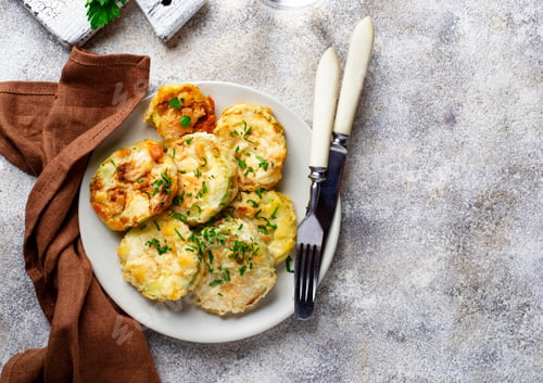 Preview: Fried zucchini slices with parsley