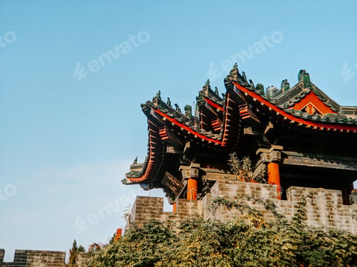 Preview: Low angle shot of a building surrounded by greenery in the Millennium city park in Kaifeng, China