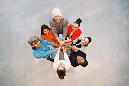 Preview: Happy young students showing unity as a team