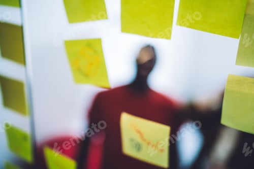 Preview: Glass board with yellow stickers in office