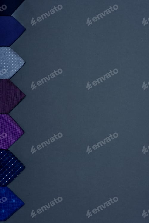 Preview: top view of various arranged colorful neckties isolated on grey