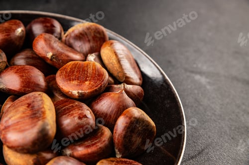 Preview: Edible chestnuts delicious treat tasty snack fresh gourmet food background on table rustic food
