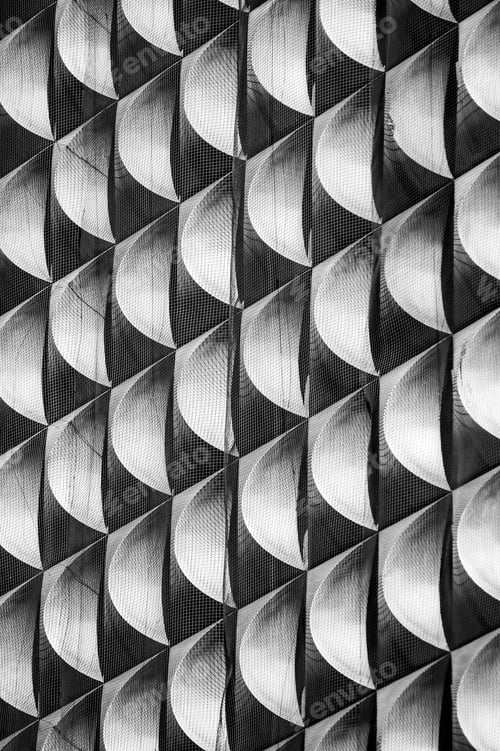 Preview: Grayscale closeup of a facade pattern of a museum