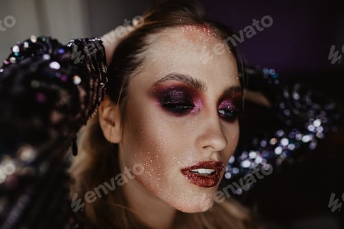 Preview: Gorgeous european woman enjoying studio photoshoot. Indoor portrait of enthusiastic female model wi