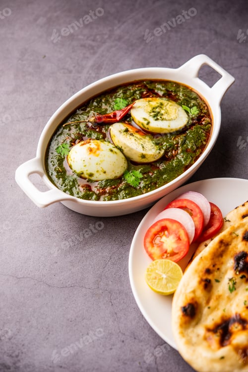 Preview: Spinach egg curry is an Indian non vegetarian dish made using palak gravy with eggs