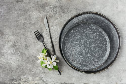 Preview: Place table setting with blossoming apple tree branches and flowers