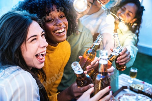 Preview: Happy friends enjoying party on rooftop terrace