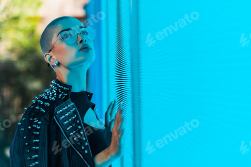 Preview: Beautiful woman illuminated by led lights