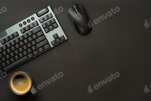 Preview: Computer keyboard and mouse on black background