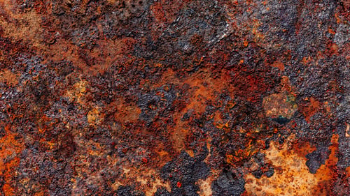 Preview: Old burnt fat on rusty surface, metal corrosion close-up, grunge textured background