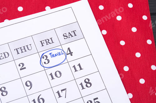 Preview: Travel day circled in a paper calendar.