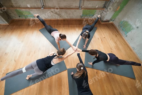 Preview: Group of women stretching in hall