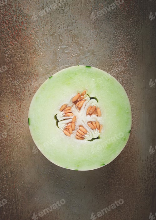 Preview: Dino melon, cut, on the table, top view, no people,